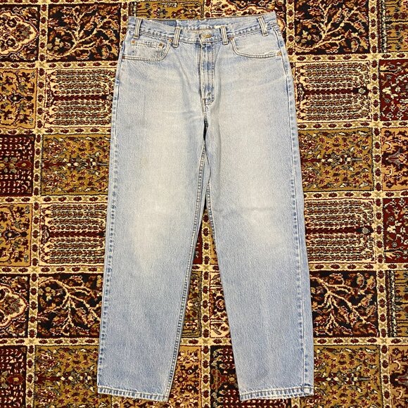 Vintage 90s Levi's 550 Relaxed Tapered fit light wash jeans - Picture 2 of 5